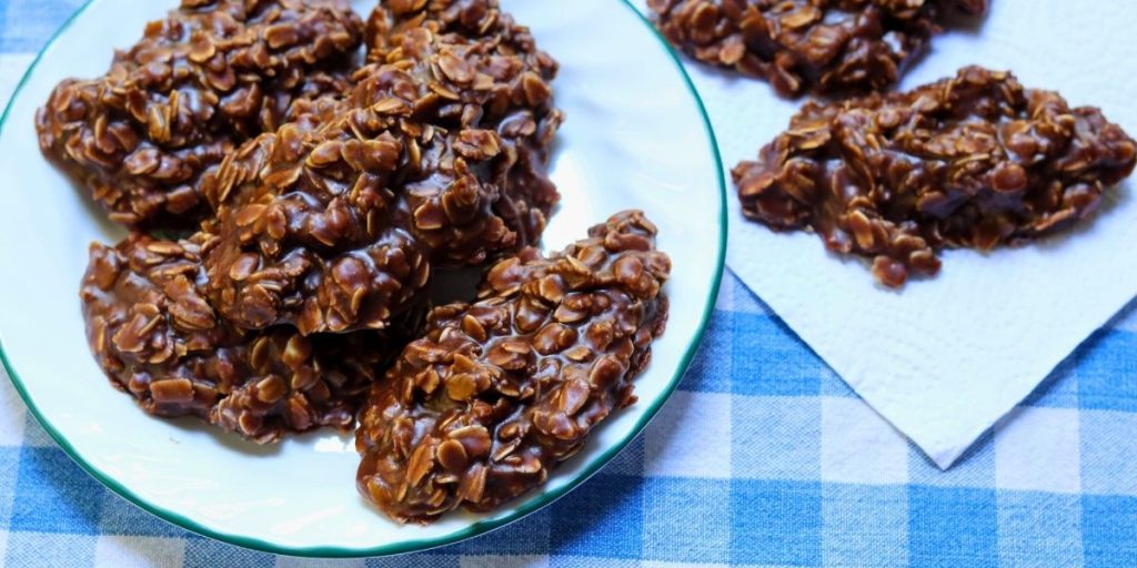a pile of high altitude no bake cookies on a white plate